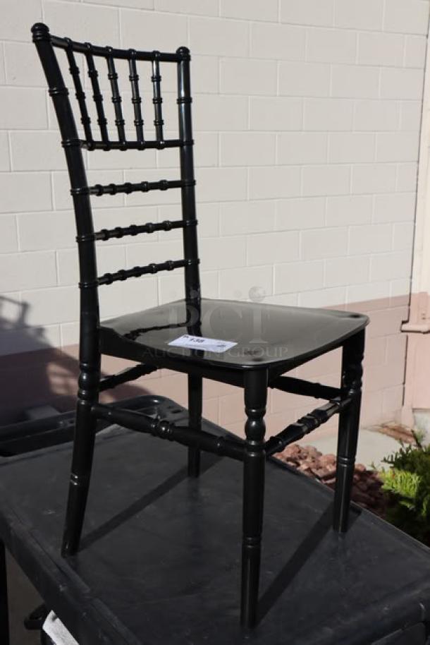 Brand new Lancaster Table & Seating Black Resin Chiavari Chair, modern design, durable resin, out of original packaging.
