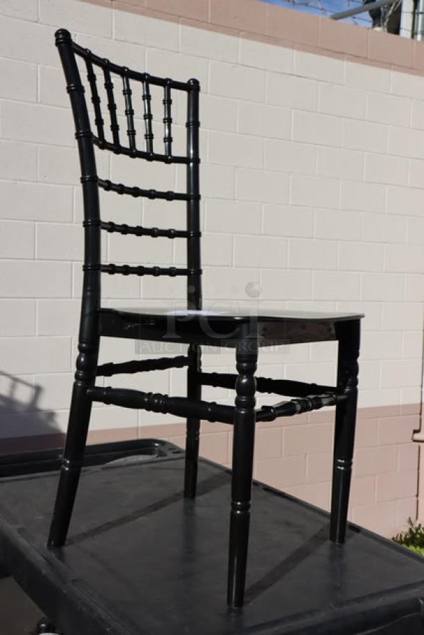 Brand new Lancaster Table & Seating Black Resin Chiavari Chair, elegant design, out of original packaging.