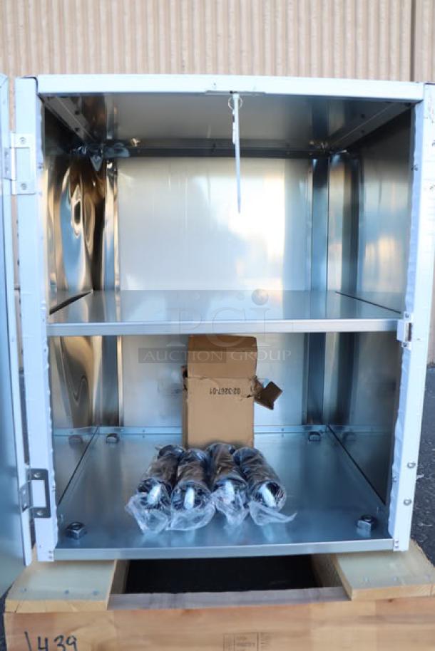 Scotsman HST21-A stainless steel ice dispenser stand, 21.5"x23.75", enclosed with door. Top back right dent. S/N 24101320015262.