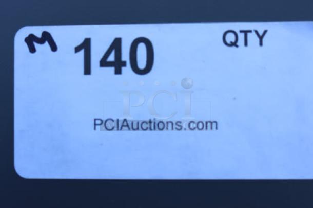Label indicating auction lot number 140. Marked with "PCIauctions.com," and penned "M" in the corner.