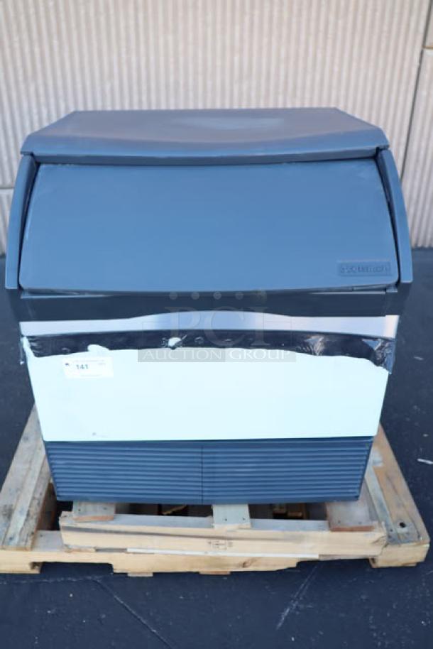 Scotsman CU3030MA-1 ice machine, 30" undercounter, air-cooled, 313 lbs capacity, minor scratches, with 6" legs and ice scoop.
