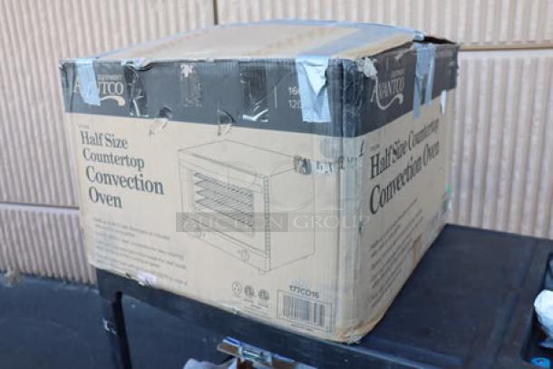 Brand new Avantco CO-16 Half Size Countertop Convection Oven in original damaged packaging. 1.5 cu. ft., model CO-16, 120V. Serial: C016D25110046.