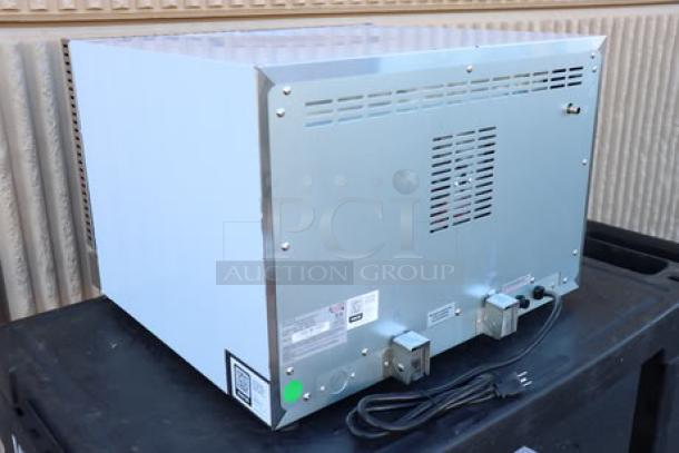 Avantco CO-16 Half Size Convection Oven, new condition, 1.5 Cu. Ft., 120V, rear view showing serial number and power cord.