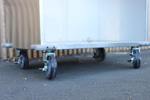 ServIt TSC-32 stainless steel tray cart, 32", 8-pan capacity, minor scratches/dents on right and back, serial 2023-9-25.