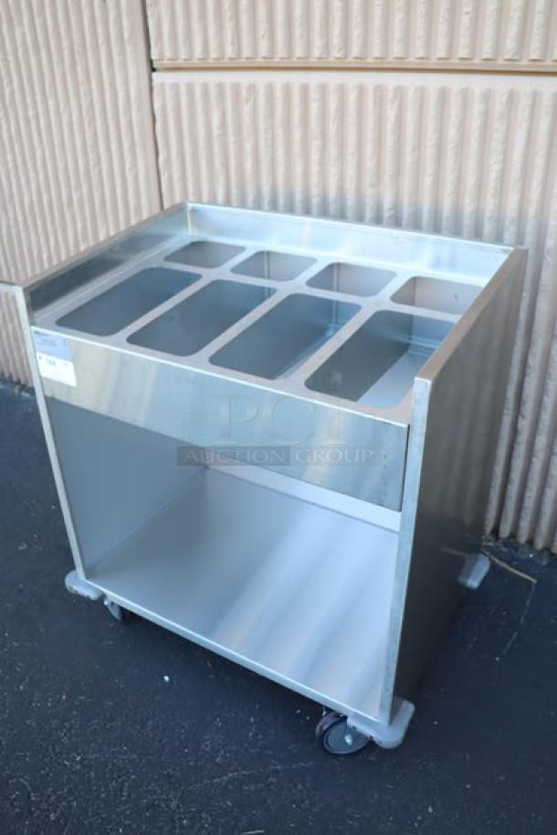 Stainless steel ServIt TSC-32 flatware/tray cart, 8 pan capacity, minor scratches and dents, S/N: 2023-9-25.