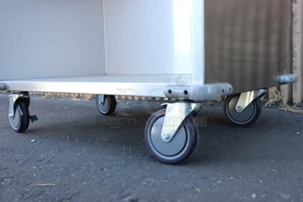 ServIt 32" stainless steel flatware/tray cart, model TSC-32, 8 pan capacity, minor scratches and dents, SN: 2023-9-25.