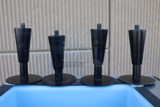 Four black adjustable legs, suitable for use with equipment like the Hoshizaki DB-130H ice dispenser.
