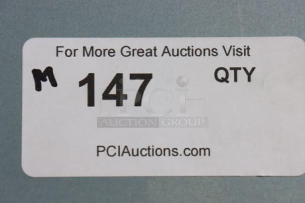 Auction item label for Avantco A-49F-HC freezer, marked with "147" and "PCIauctions.com," indicating auction details.