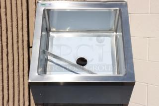 Regency 29" one-compartment mop sink, model 600SM242412, 16-gauge stainless steel, 24"x24"x12" bowl, minor dents, scratches.