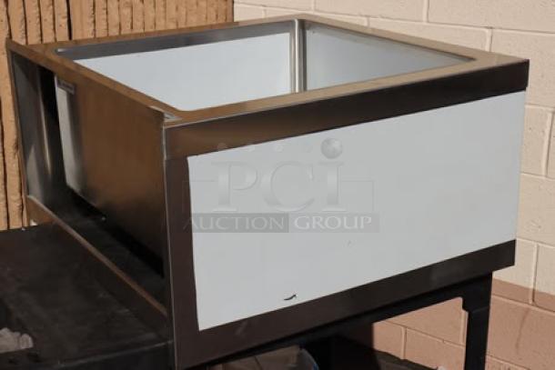 Regency 29" stainless steel mop sink, model 600SM242412, minor dents and scratches, new condition, 24"x24"x12" bowl.