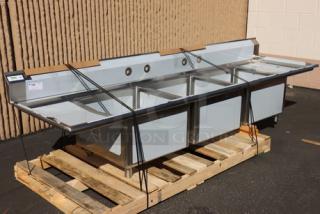 Regency 124" stainless steel three-compartment commercial sink with 2 drainboards; model 600S32424218; bent back right leg socket.