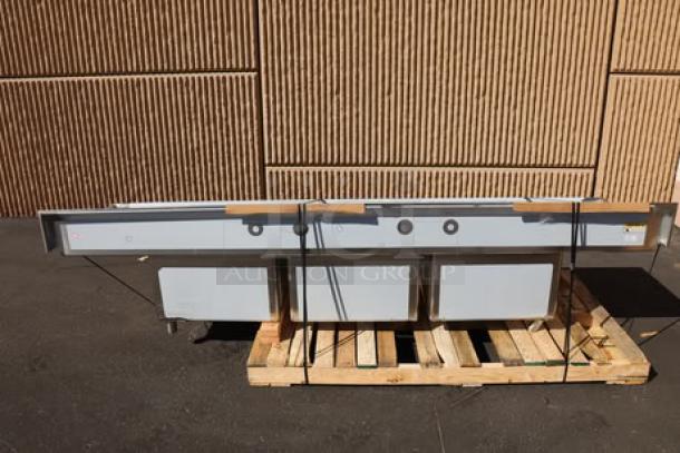 Regency 124" stainless steel three-compartment sink with drainboards, Model 600S32424218, new, bent back right leg socket.