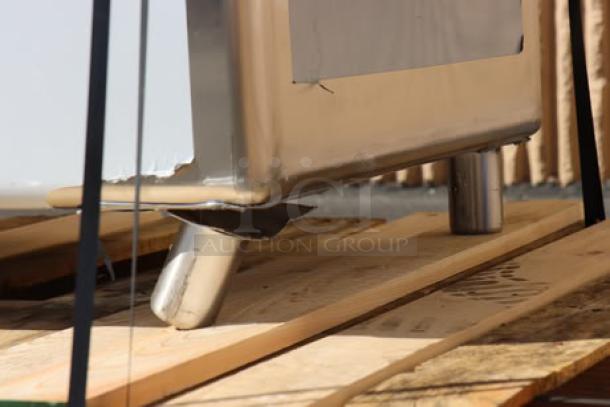 Regency 124" stainless steel sink leg socket bent. Model 600S32424218. Features three compartments, two drainboards.