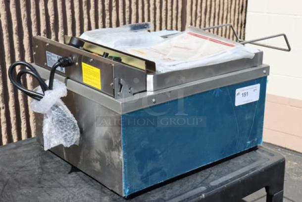 New Carnival King DFC44001 25 lb. funnel cake fryer, 240V, 4400W, serial 4109324382DFC44001, no packaging, on a black surface.