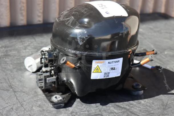 Brand new Avantco 17817638 compressor, suitable for various models. Out of original packaging. Label shows model NUT70NR and safety certifications.