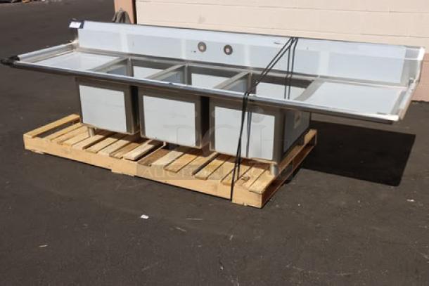BRAND NEW Regency 600S31824224 three compartment stainless steel sink, 16 gauge, with two 24" drainboards on pallet.