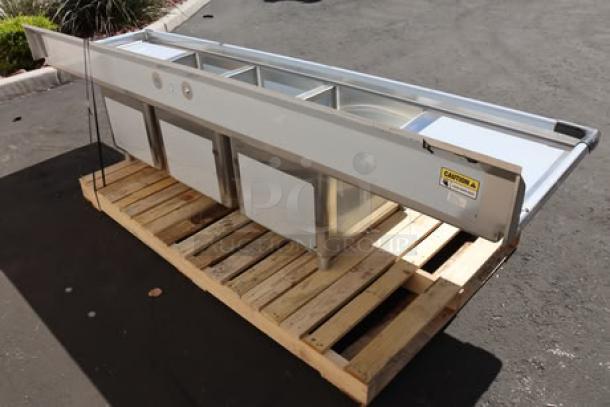 Regency 600S31824224 three-compartment stainless steel sink, brand new scratch and dent, with two 24" drainboards.