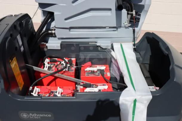 Advance SC901 ST 28D 28" cordless floor scrubber, brand new. Features 310 Ah wet batteries, charger, and 28" scrub deck.