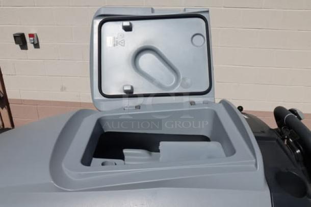 Advance SC901 ST 28D floor scrubber, brand new, 28" cleaning path, 30-gallon tank, 36V, includes charger and pad holders.