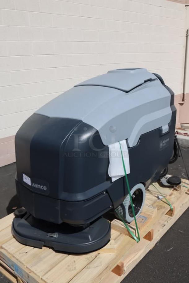 Brand new Advance SC901 ST 28D floor scrubber with 28" cleaning path, 30-gallon tank, and 310 Ah batteries.