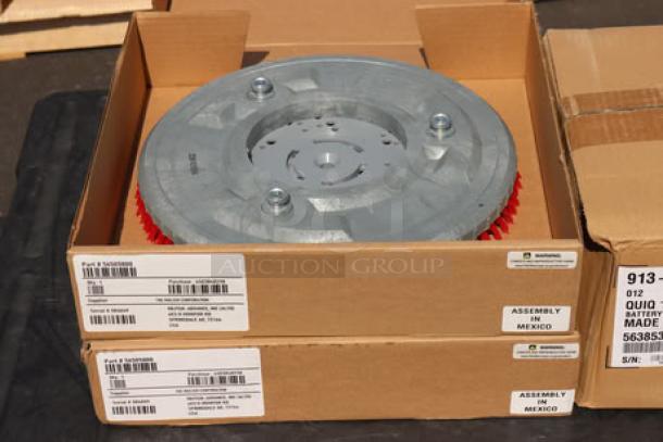 Advance SC901 ST 28D floor scrubber pad in box, new condition, labeled "Assembly in Mexico," part of cordless 28" walk-behind scrubber set.