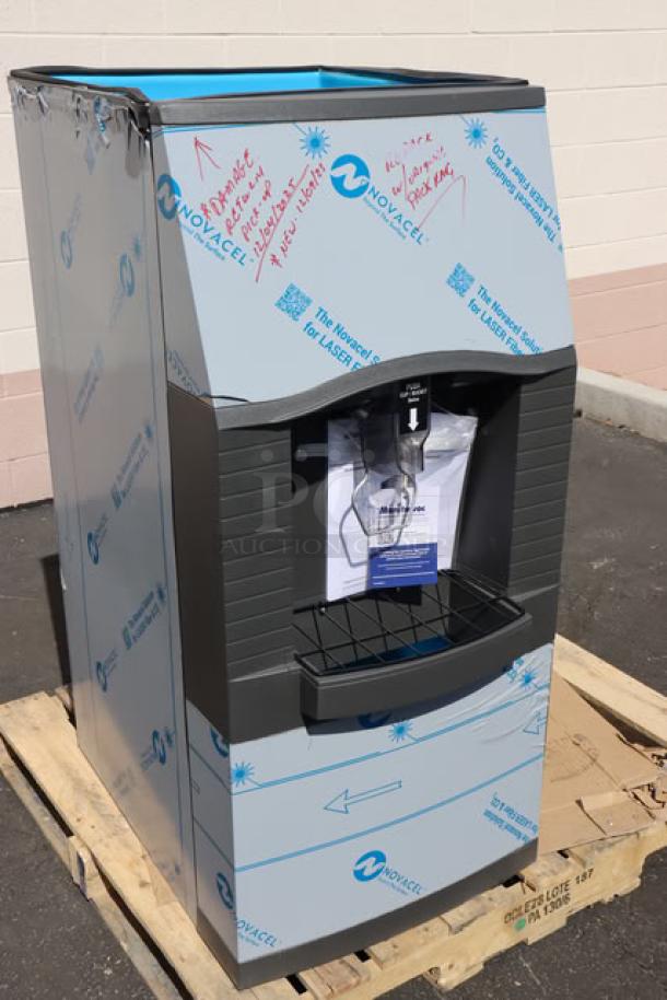 Manitowoc SPA162-161 touchless hotel ice dispenser, new scratch-n-dent condition, 22", 115V, 120 lb capacity, with protective covering.