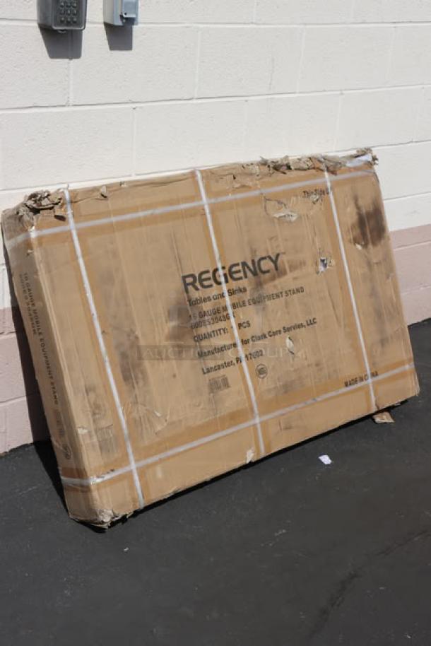 BRAND NEW SCRATCH-N-DENT Regency 30"x48" stainless steel work table box, visible wear, Regency logo, model 600ES3048GK.