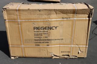 Cardboard box labeled "Regency 600DDT48R Soiled Dish Table," slightly damaged. Contains new 4' dish table with right drainboard.