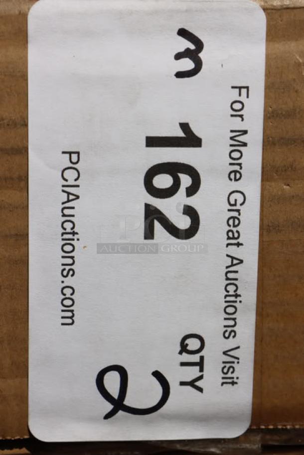 Sticker on box marked "162 QTY 2" from PCI Auctions, referencing a Regency 16 Gauge 4' Soiled Dish Table.