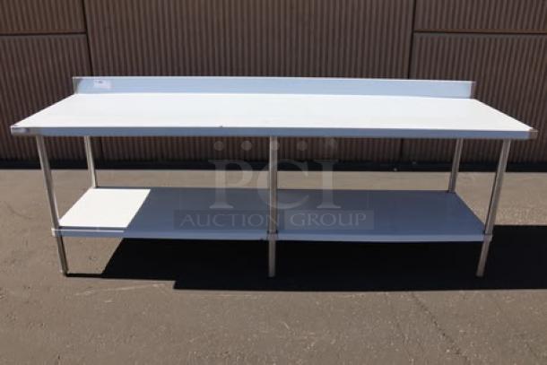 BRAND NEW Regency 600TSB3096S 30"x96" 16-gauge stainless steel work table with 4" backsplash, undershelf, slight scratches.
