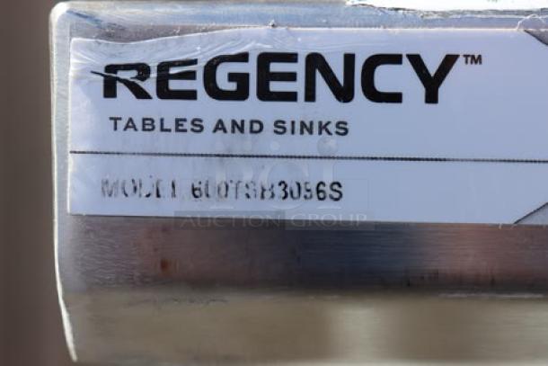 Regency 600TSB3096S stainless steel work table, 30" x 96", 16-gauge, with 4" backsplash and undershelf, brand new.