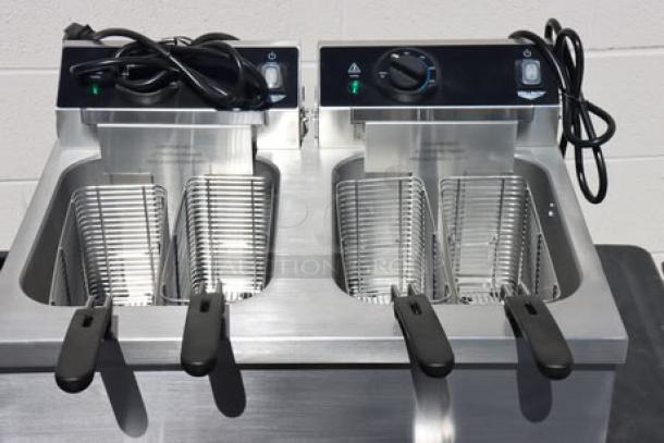Brand new Vollrath CF4-3600DUAL 30 lb. commercial countertop deep fryer, dual baskets, 208-240V, stainless steel, S/N: P215-37591539-010.