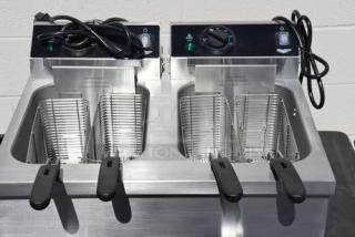 Brand new Vollrath CF4-3600DUAL 30 lb. commercial countertop deep fryer, dual baskets, 208-240V, stainless steel, S/N: P215-37591539-010.
