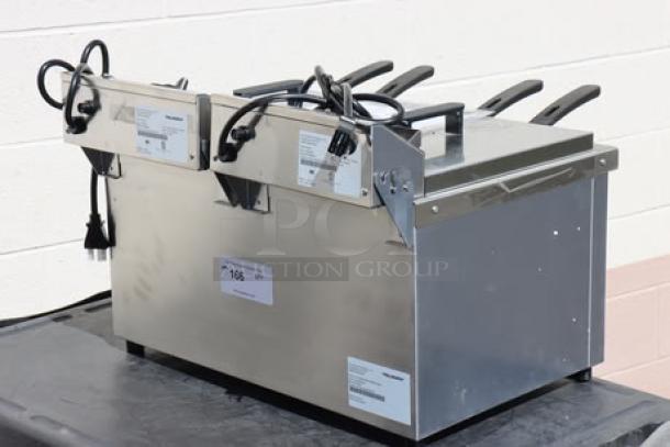 Brand new Vollrath CF4-3600DUAL 30 lb. commercial countertop deep fryer, 208-240V, with visible labels and power cords.