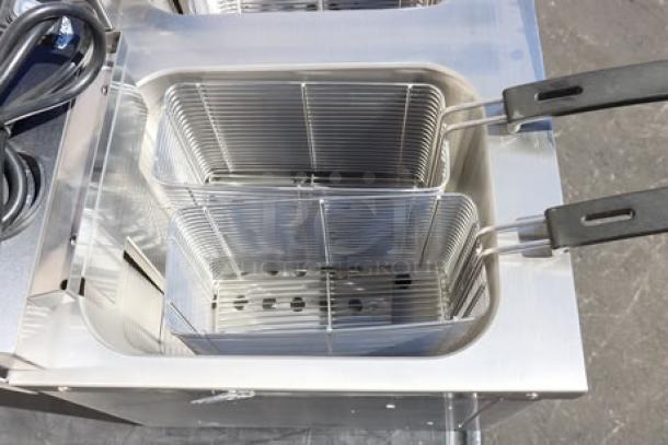 Brand new Vollrath CF4-3600DUAL 30 lb. countertop deep fryer, stainless steel, dual baskets, S/N P215-37591539-010.
