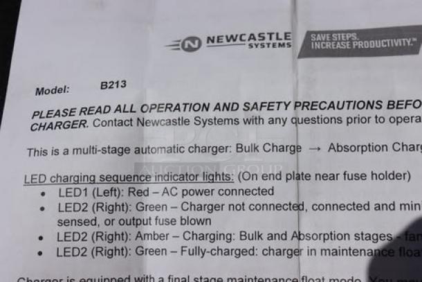 Newcastle Systems mobile workstation model B213, features LED charge indicators and safety instructions.