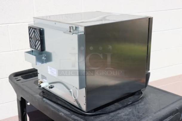 Brand new Cooking Performance Group COQ-T3-A convection oven, electric, thermostatic, 3 tray, quarter size, 120V, 1,650W. Glass broken.