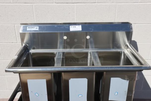 Regency 600S31014 stainless steel 3-compartment sink, 39", 16-gauge, galvanized legs, no drainboards. Brand new, minor dents.