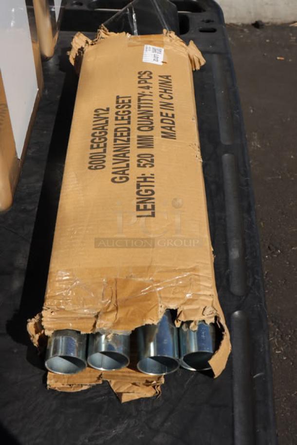 Cardboard box containing galvanized steel legs for Regency 600S31014 sink. Label reads "600LEGGALV2, Length: 520 mm, Made in China."
