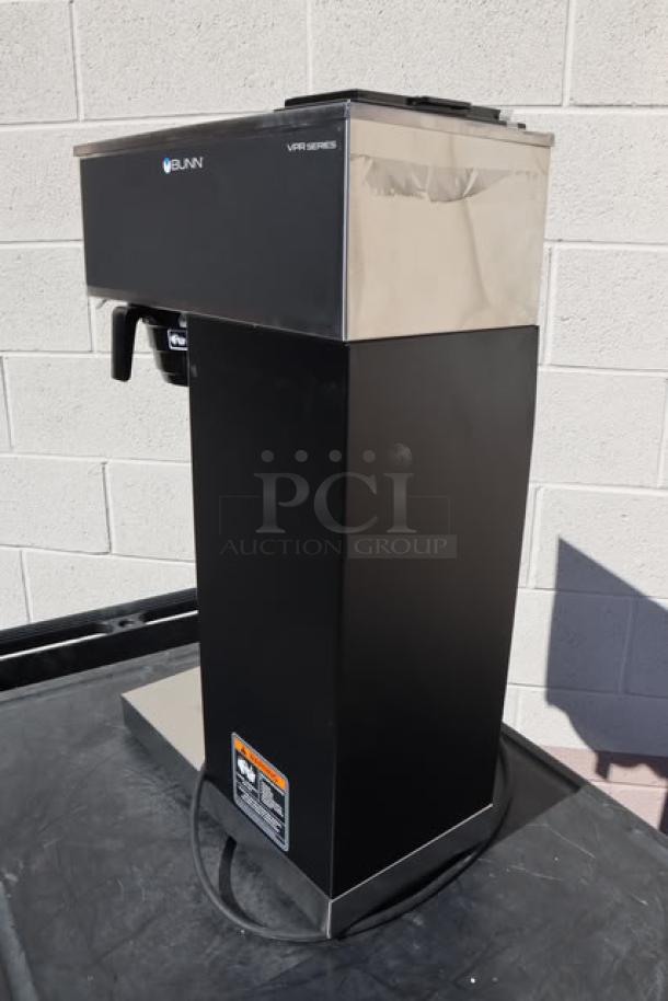 Bunn 33200.0010 VPR-APS Pourover Airpot Coffee Brewer, stainless steel, black, shown with power cord. Brand new scratch-n-dent condition.