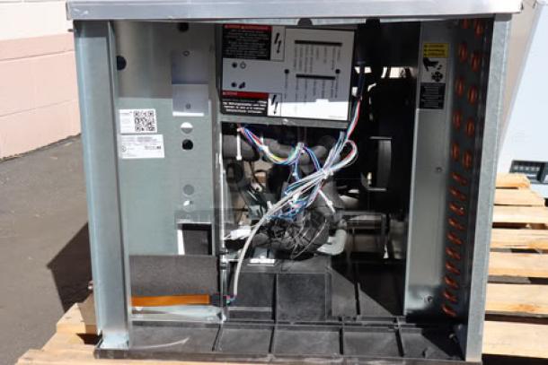 Ice-O-Matic CIM0530HA90 ice machine, brand new, 30", air-cooled, half dice cubes, 115V, 525 lb capacity, visible internal wiring.