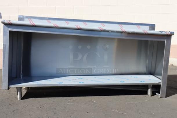 Brand new Advance Tabco EK-SS-246 stainless steel 24" x 72" work table, open cabinet base, 5" backsplash, minor scratches.