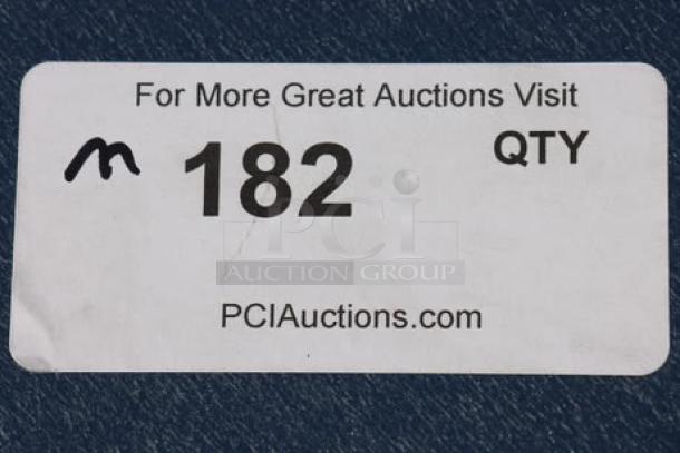 Sticker indicates auction lot number 182 by PCI Auctions.
