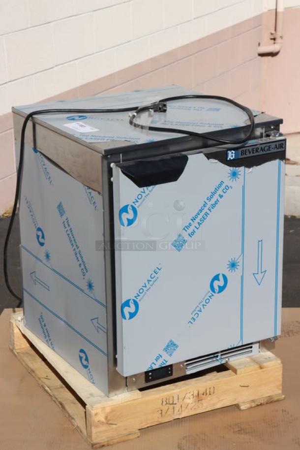 Beverage-Air UCF20HC undercounter freezer, new condition, on pallet. Novacel protective wrap, power cord visible.