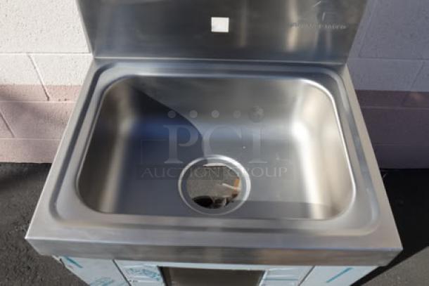 Advance Tabco 7-PS-99 hands-free hand sink, stainless steel, out of box, with pedestal base, soap, towel dispenser, trash bin.