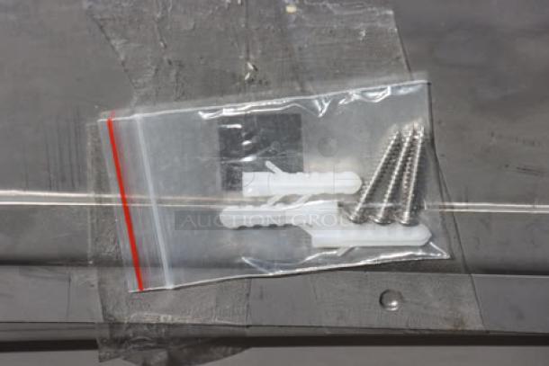 Advance Tabco 7-PS-99 hardware kit with screws and anchors in a clear plastic bag.