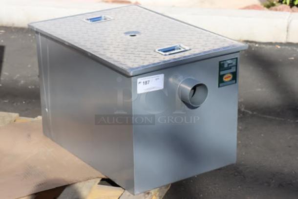 Brand new Regency 600GT grease trap, 25 GPM, 50 lb. capacity, PDI certified, with 3" non-threaded connections, slight scratches.
