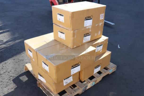 Auction image showing 8 boxes of Acopa Alchemy 16 oz. Hammered Dark Antique Copper Moscow Mule Mugs, model 553AQCMH16, on a pallet.