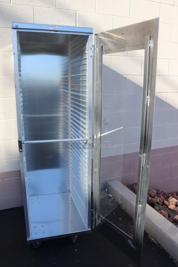 Brand new Winholt EC1840-C-LD pan rack, 40 capacity, clear acrylic door, assembled, stainless steel, no original packaging.