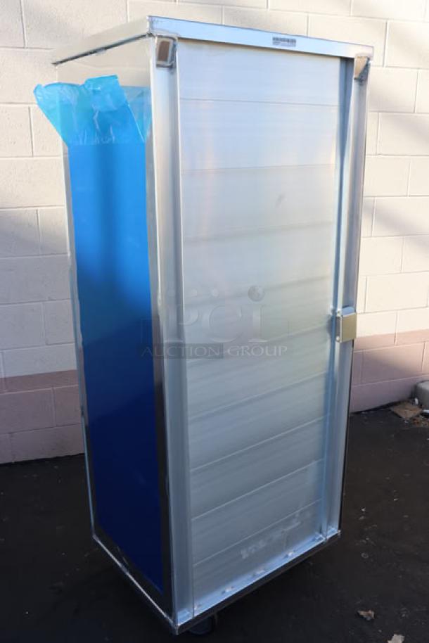 Brand new Winholt EC1840-C-LD 40 Pan End Load Sheet Pan Rack with clear acrylic door, assembled, no original packaging.